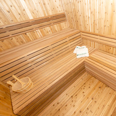 Knotty Interior View of Cedar Neptune Pure Cube Outdoor Sauna