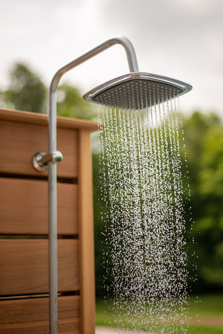 Outdoor shower with running water