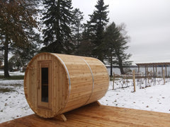 Knotty Barrel Sauna at Cottage in winter