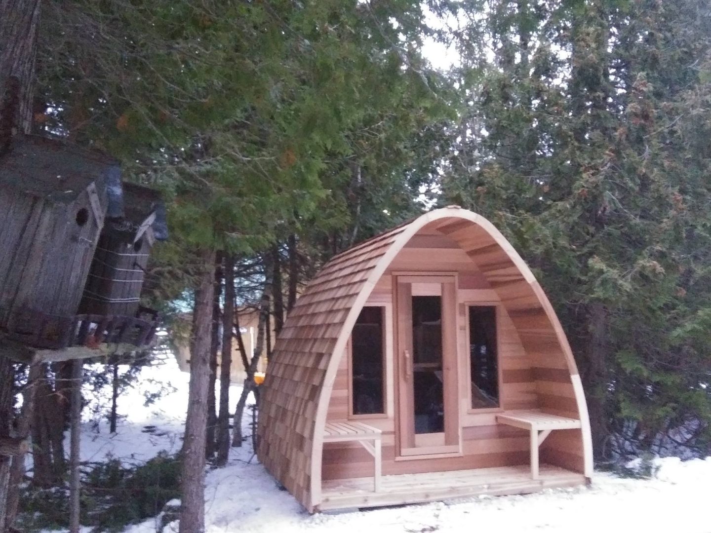 Red Cedar Pod sauna with cedar shingles and Porch