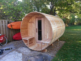 Knotty Barrel Sauna with porch in backyard