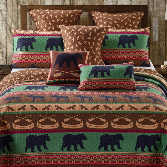 Bears, canoes and moose on quilt