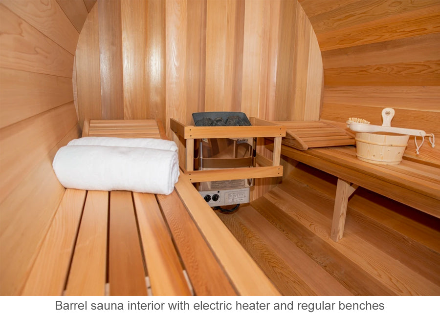 Barrel sauna interior with electric heater and regular benches