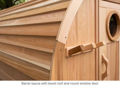 Barrel sauna with bevel roof and round window door