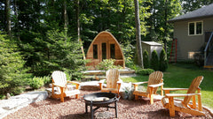 Knotty Pod Sauna with porch and windows in backyard