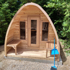 Beautiful knotty pod sauna with porch and windows