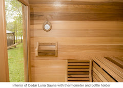 Interior of cedar Luna Sauna with thermometer and bottle holder