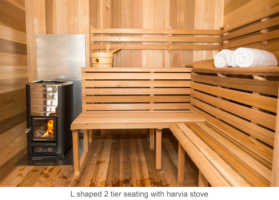 L shaped 2 tier seating with Harvia stove