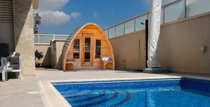 Knotty Pod Sauna with porch and windows by the pool