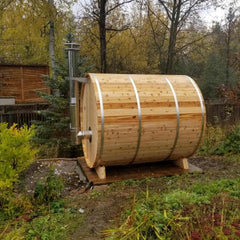 Exterior of knotty barrel sauna