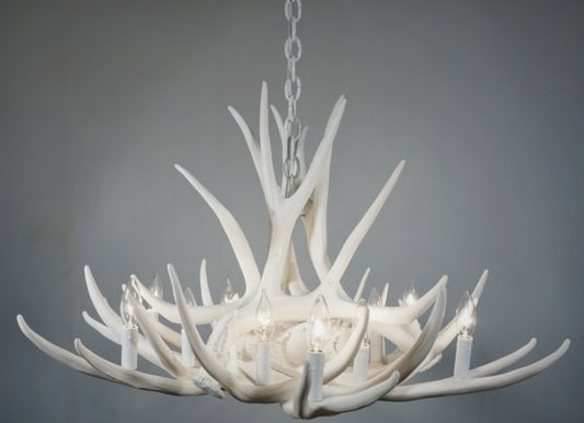 white faux chandelier deer