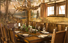 dining room with elk chandelier