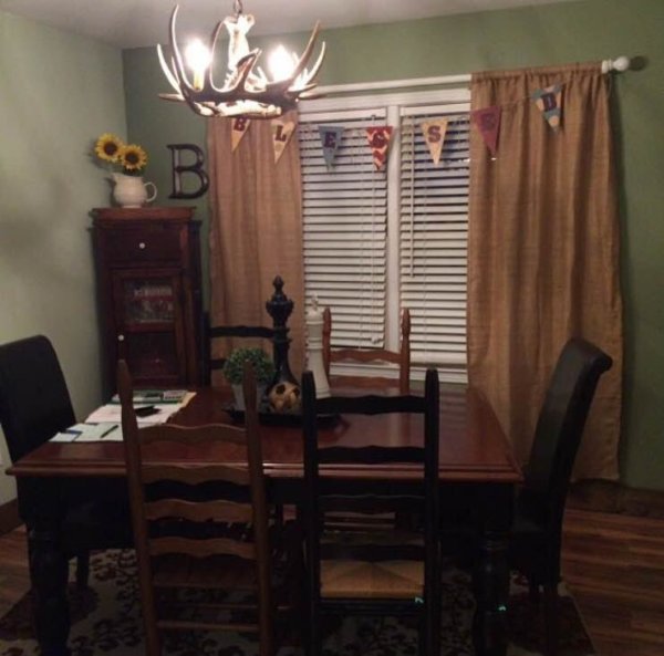 antler chandelier over dining table