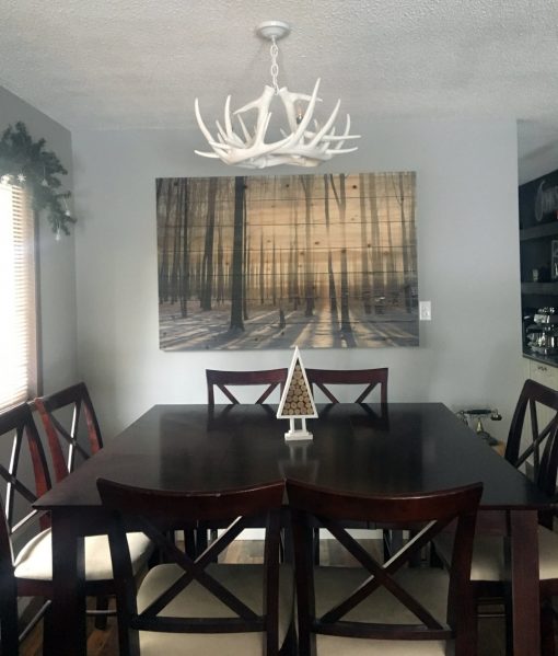 Whitetail faux deer chandelier in dining room